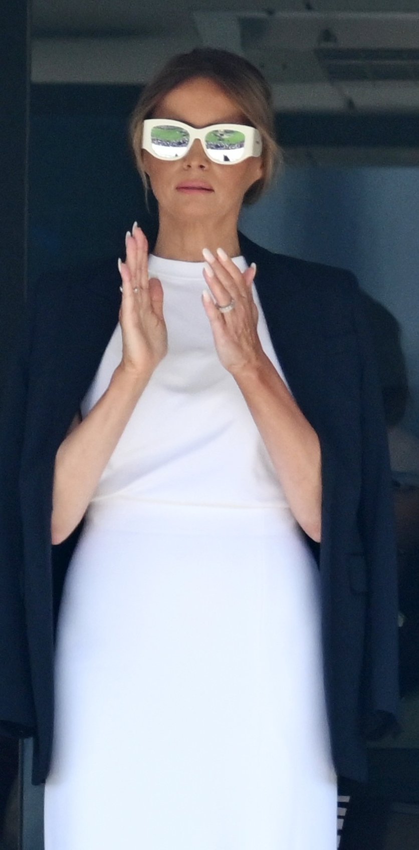 fashion notes melania trump is white hot in michael kors christian dior shades for fifa world cup