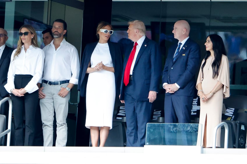 fashion notes melania trump is white hot in michael kors christian dior shades for fifa world cup