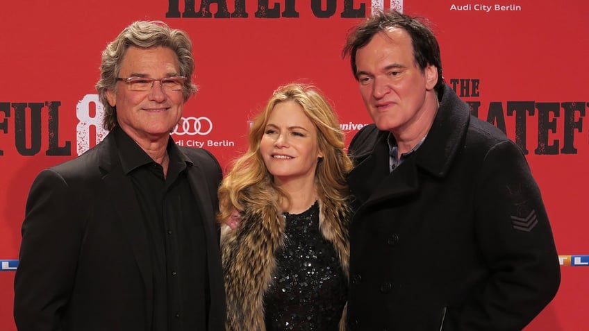 Kurt Russell, Jennifer Jason Leigh, Regisseur Quentin Tarantino posing together at The Hateful Eight premiere in Germany