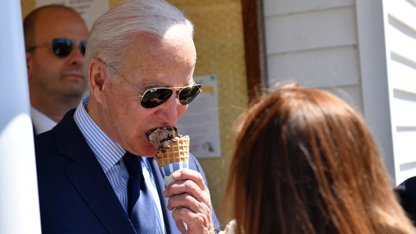 President Joe Biden eats a chocolate chip ice cream at Honey Hut Ice Cream in Cleveland, Ohio, on May 27, 2021.