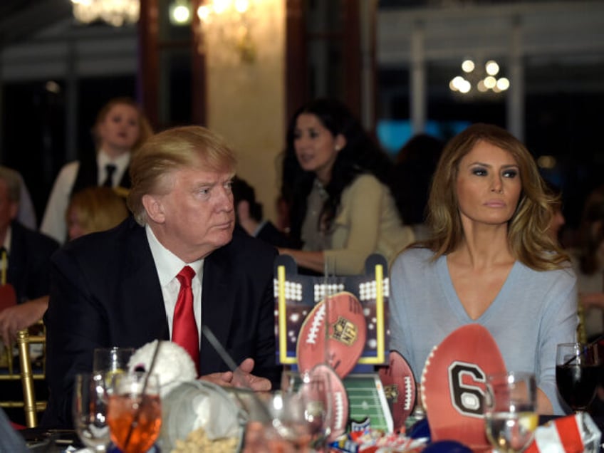 In this Feb. 5, 2017 file photo, President Donald Trump and first lady Melania Trump watch