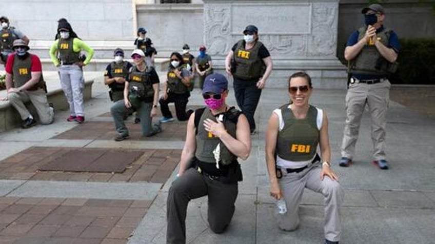 fbi agents who bent the knee to blm in iconic photo have been demoted