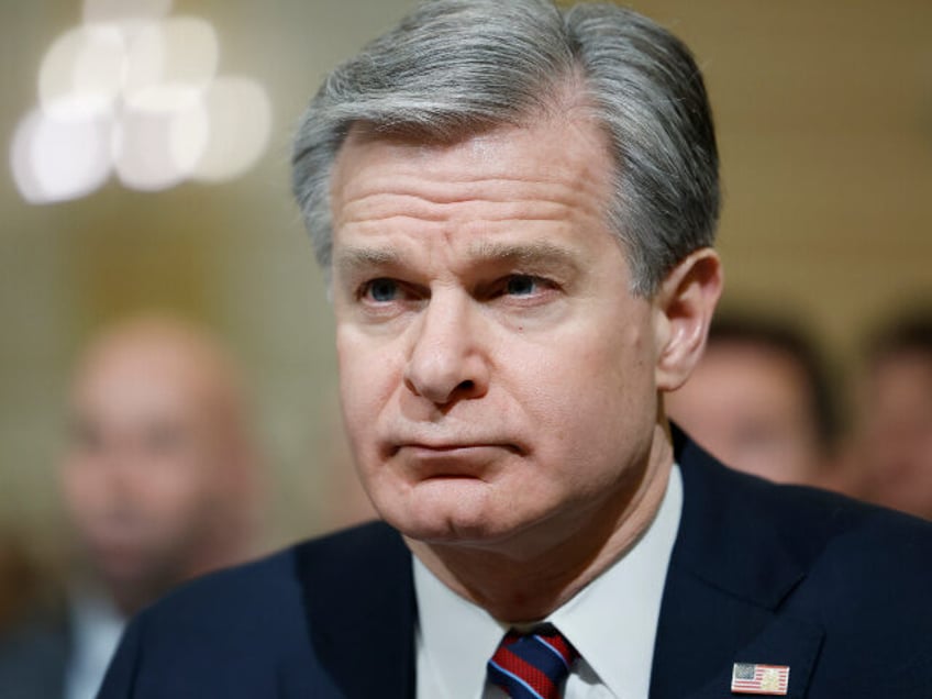 WASHINGTON, DC - MARCH 12: Federal Bureau of Investigation Director Christopher Wray liste