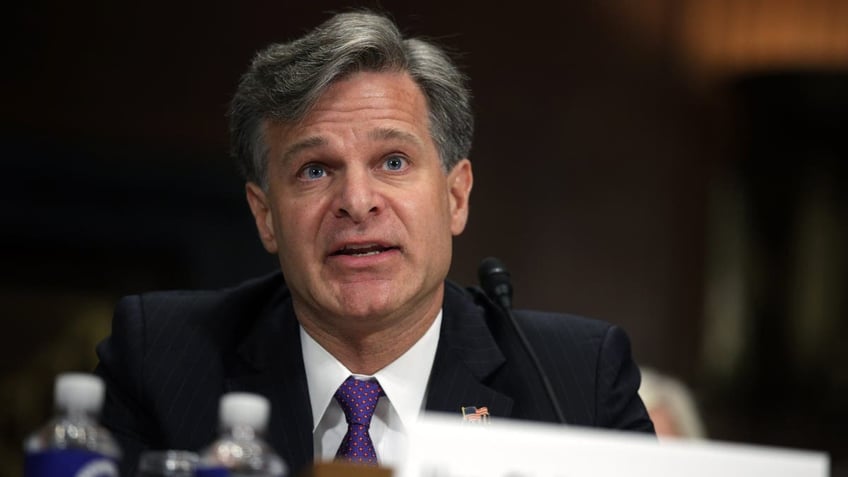 Christopher Wray speaking