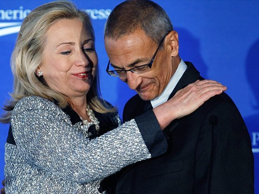 fbi doj launch probe into firm of clinton campaign chairman john podesta