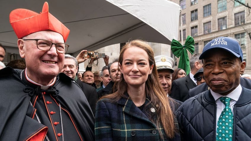 Laura Kavanagh poses with Cardinal Timothy Dolan and Mayor Eric Adams