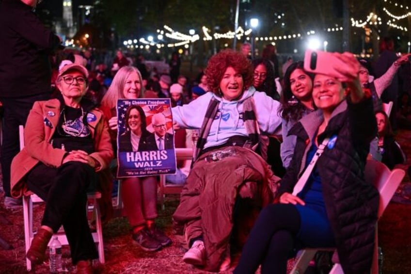 Supporters gather ahead of a star-studded rally for Kamala Harris featuring Lady Gaga and