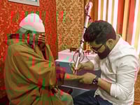Fearing Indian police, Kashmiris scrub ‘resistance’ tattoos