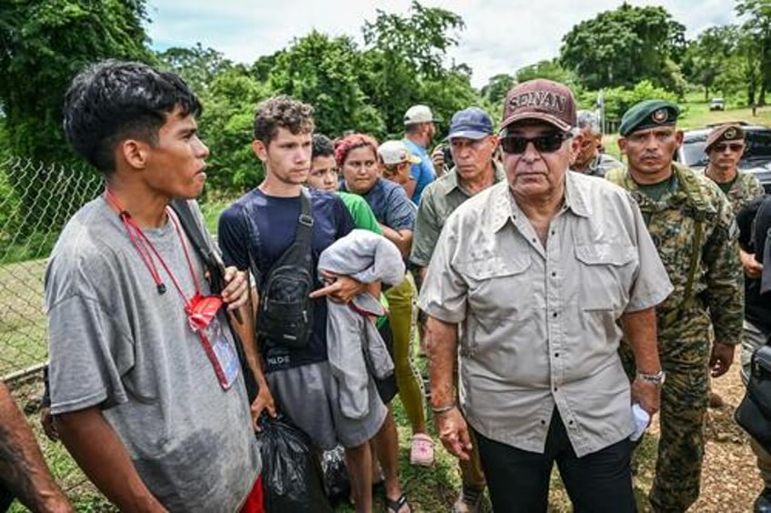 fearing new panama president will block key route to us migrants flood darien gap