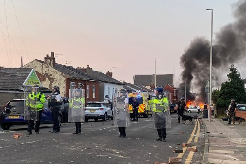 Clashes have erupted in cities across England and Northern Ireland since a mass stabbing i