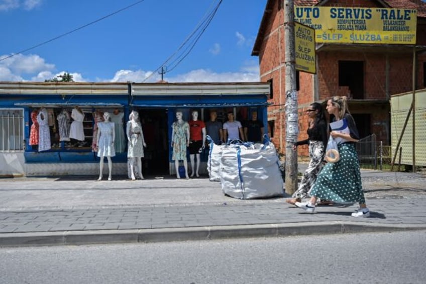 A clothing store Gracanica, central Kosovo, where a ban on the Serbian dinar has spurred f