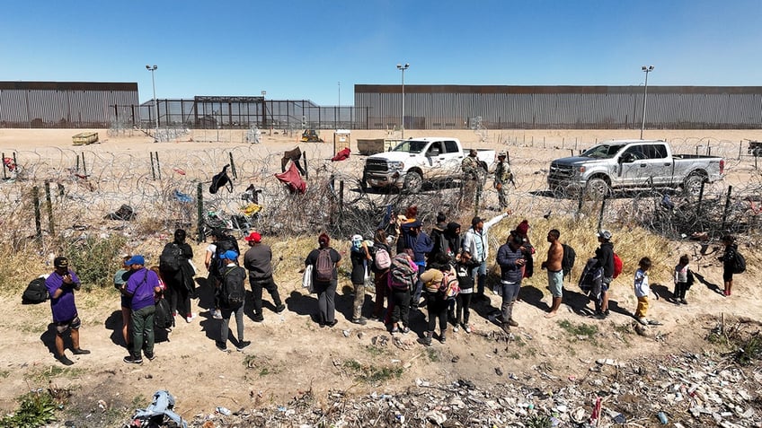 Migrants walking near border
