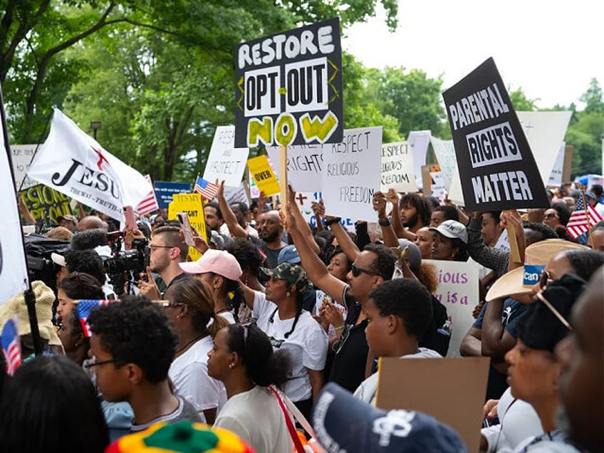 Rockville, MD - June 27: A large group of parents protested in Rockville, Maryland on June