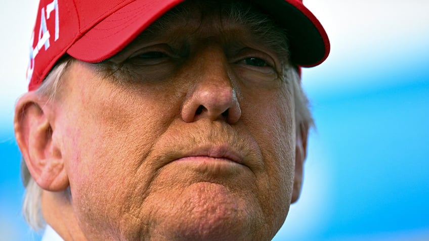 Donald Trump wearing a MAGA hat