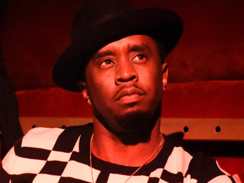 WEST HOLLYWOOD, CA - JUNE 24: Entrepreneur and artist Diddy performs on stage with son Jus
