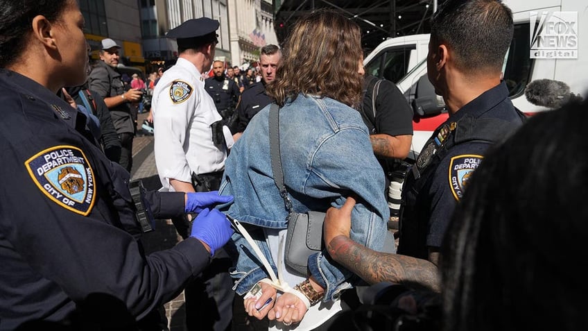 A woman is arrested during a protest in New York City