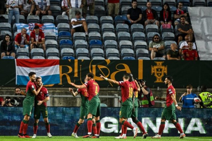 fernandes shines as portugal lash luxembourg in record 9 0 win