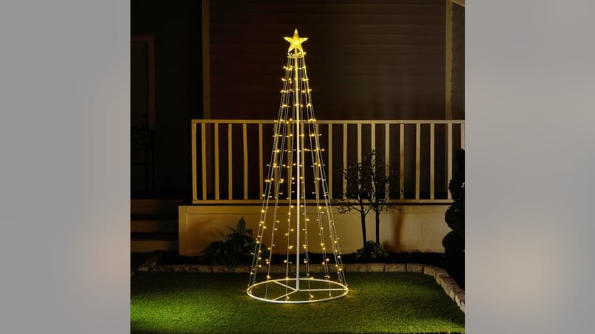 Put up a lighted Christmas tree outside as well as inside. 