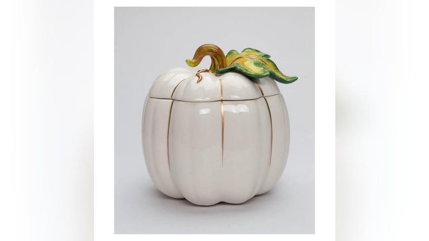 A festive yet practical ceramic pumpkin cookie jar adds a touch of charm to your countertop. 