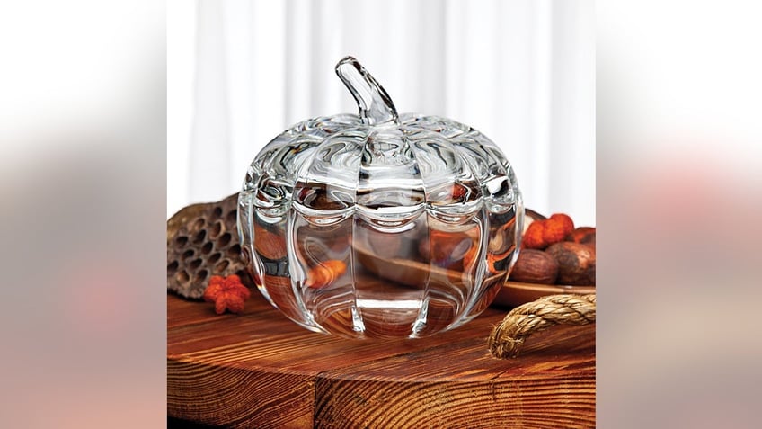 This glass pumpkin jar easily stores fall treats with a sophisticated touch.