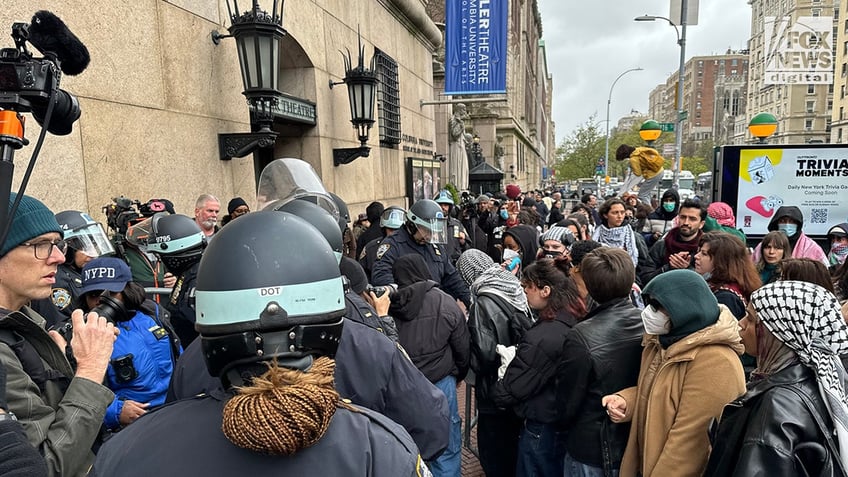 NYPD officers patrol as pro-Palestinian students demonstrate outside of Columbia University’s campus