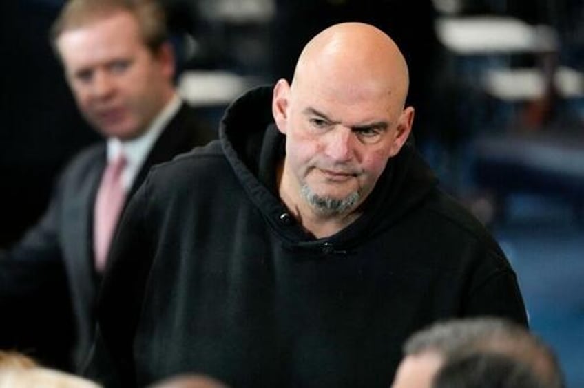 fetterman votes with republicans to advance hegseth says he wont switch to gop