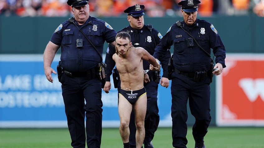 field invader wearing virginity rocks garment interrupts orioles rangers playoff game