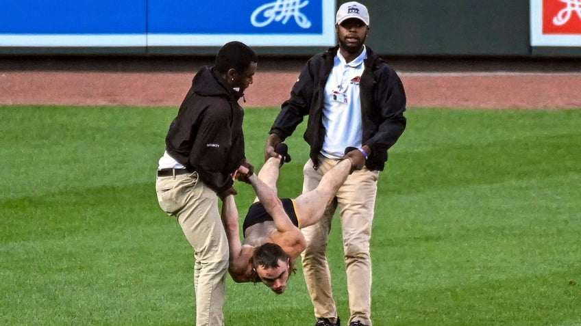 field invader wearing virginity rocks garment interrupts orioles rangers playoff game