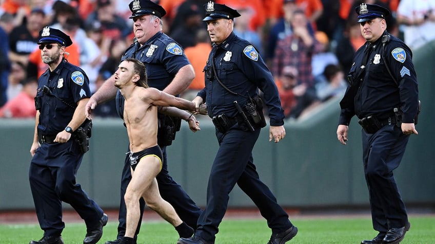 field invader wearing virginity rocks garment interrupts orioles rangers playoff game