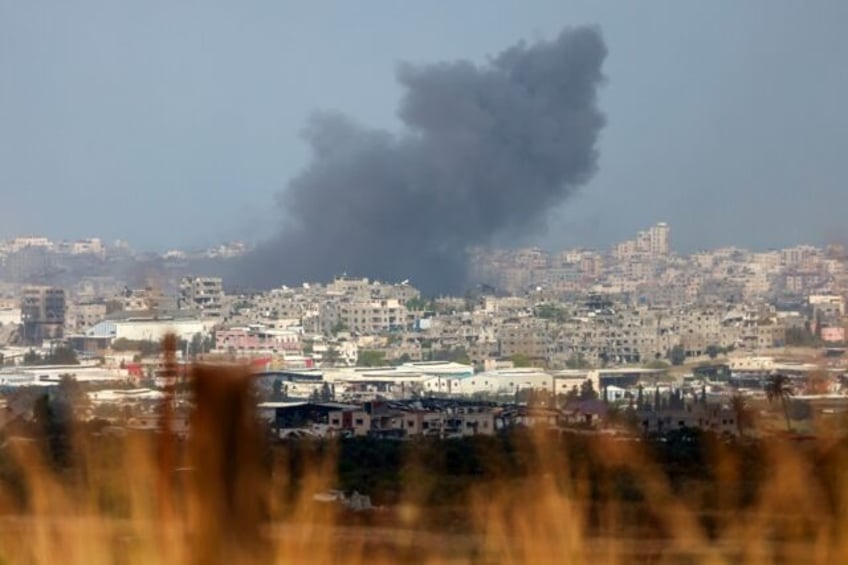 Smoke billows during Israeli bombardment on the Gaza Strip