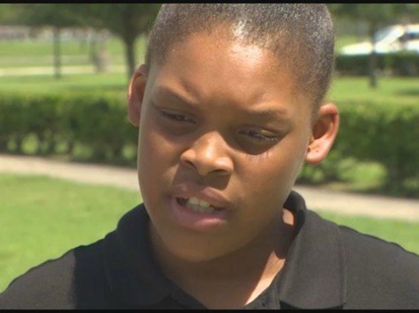 fifth grader kneels in protest of pledge of allegiance