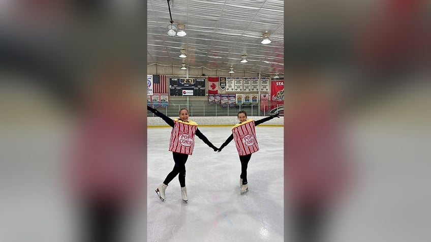 Cheesman and daughter on the ice