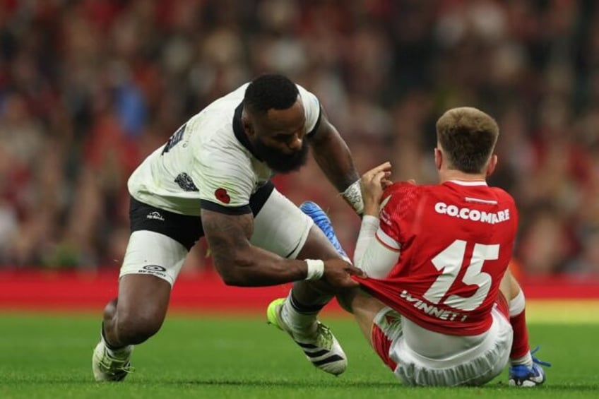 Fiji's Semi Radradra (L) was sent off for his challenge on Wales's Cameron Winnett (R) in