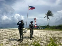 Filipino forces and villagers struggle to live in China’s shadow in disputed waters