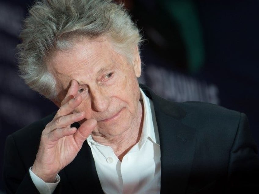 French-Polish director and former president of the Jury, Roman Polanski, arrives on the re