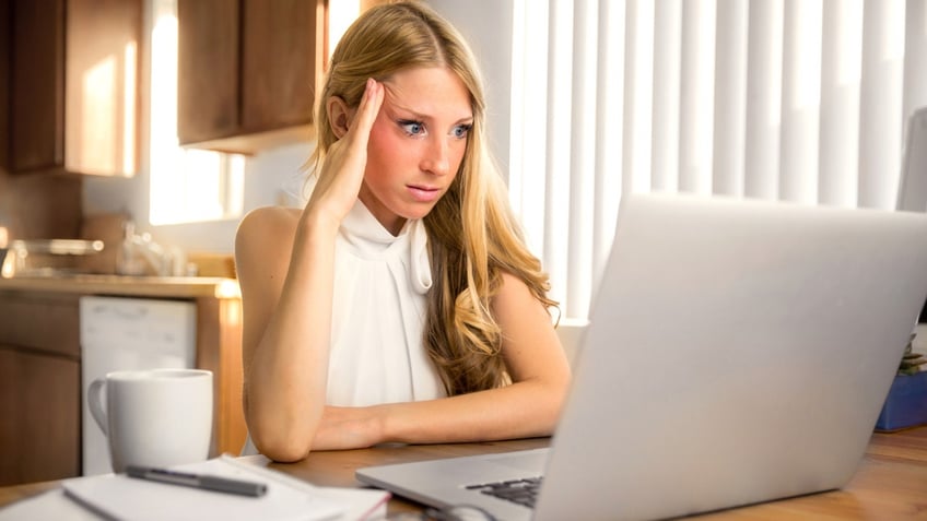 frustrated woman at computer