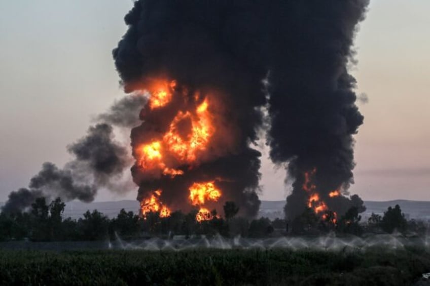 The cause of the blaze, which began in an asphalt tank, was not yet known, Iraqi civil def