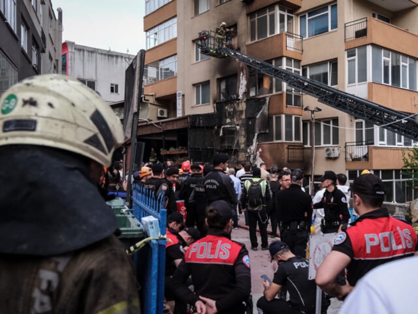 ISTANBUL, TURKEY - APRIL 02: Firefighters, police and emergency services members work the