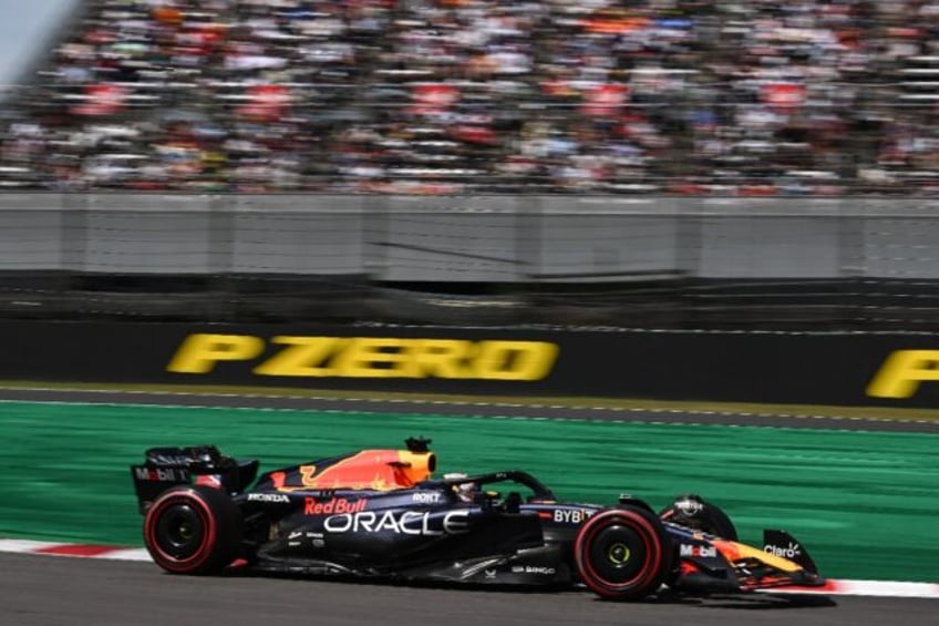 fired up verstappen takes japanese gp pole position