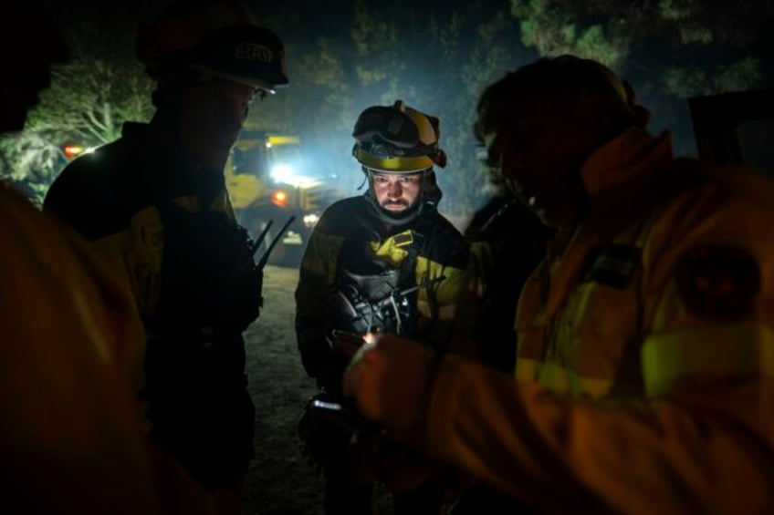 firefighters battle through the night to halt wildfire in spains popular tourist island of tenerife