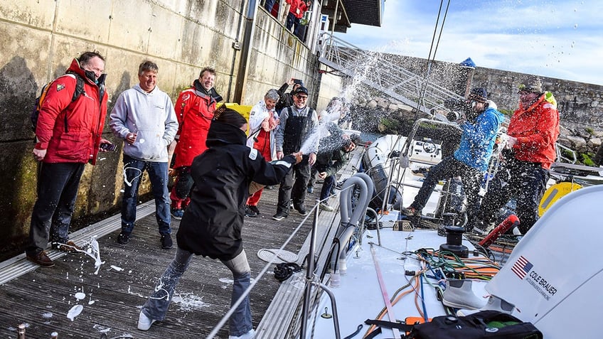 celebration after sailing around the world