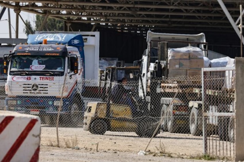 first of 20 aid trucks enter besieged gaza from egypt