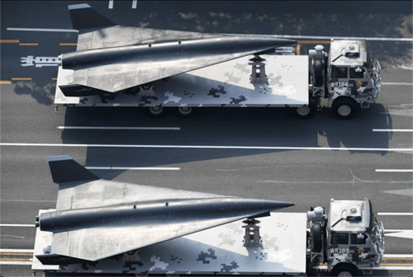 first real image of chinese supersonic drone attached to bomber 