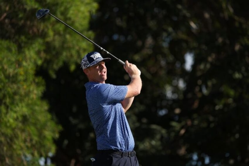 Patrick Fishburn's fired a 65 to take a share of the lead at the halfway stage of the PGA