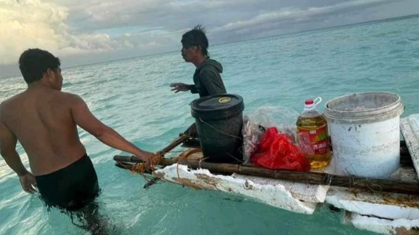 stranded fishermen in water