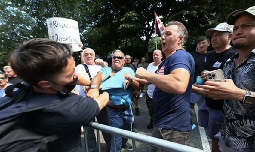 fists fly bodies slammed as antifa crashes anti migrant protest at nyc mayors mansion