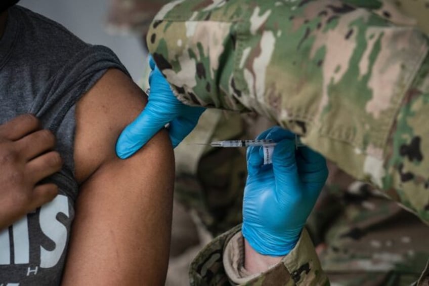 A US man receives a coronavirus vaccine