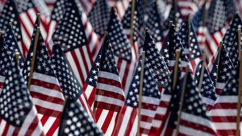 Some 37,000 U.S. flags make up the Memorial Day Flag Garden by the Soldiers and Sailors Monument in Boston Common on May 25, 2024. (Joseph Prezioso/AFP via Getty Images)