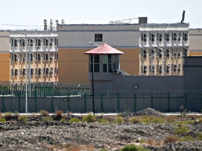 This photo taken on June 2, 2019 shows buildings at the Artux City Vocational Skills Education Training Service Center, believed to be a re-education camp where mostly Muslim ethnic minorities are detained, north of Kashgar in China's northwestern Xinjiang region. - As many as one million ethnic Uighurs and other mostly Muslim minorities are believed to be held in a network of internment camps in Xinjiang, but China has not given any figures and describes the facilities as Òvocational education centresÓ aimed at steering people away from extremism. (Photo by GREG BAKER / AFP) / TO GO WITH China-Xinjiang-media-rights-press,FOCUS by Eva XIAO (Photo credit should read GREG BAKER/AFP/Getty Images)