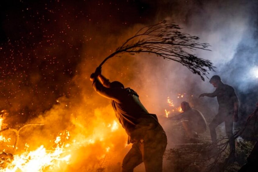 flames devour forests and homes as wildfires that have left 20 dead in greece burn out of control